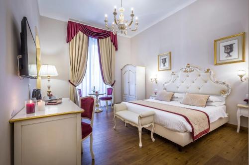Ένα ή περισσότερα κρεβάτια σε δωμάτιο στο B&B La Terrazza Sul Duomo