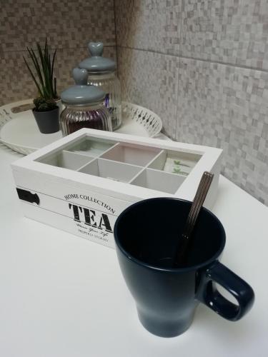 a kitchen sink with a bowl and a utensil at Casa Del Beso in Luarca