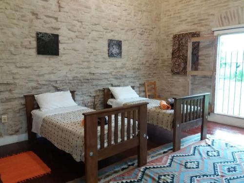 Ένα ή περισσότερα κρεβάτια σε δωμάτιο στο Casa Rodo 53