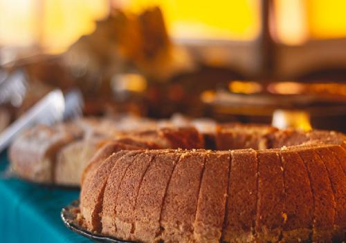 a close up of a cake on a table at Lonier Ilha Inn Flats in Abraão