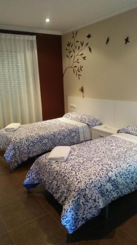 A bed or beds in a room at casa remei