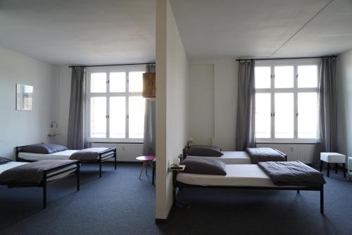 Posteľ alebo postele v izbe v ubytovaní klassMo Gästehaus