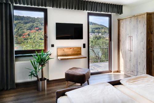 Ένα ή περισσότερα κρεβάτια σε δωμάτιο στο Hotel garni "Café im Hamm"
