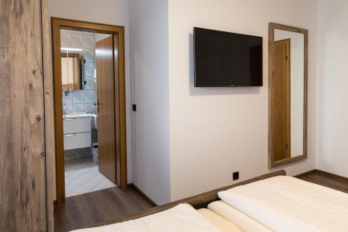 Ένα ή περισσότερα κρεβάτια σε δωμάτιο στο Hotel garni "Café im Hamm"