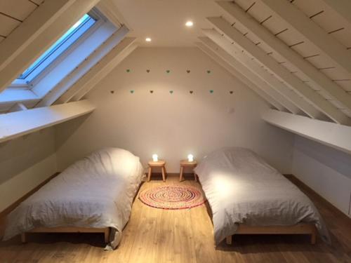 Giường trong phòng chung tại De Veldmuis