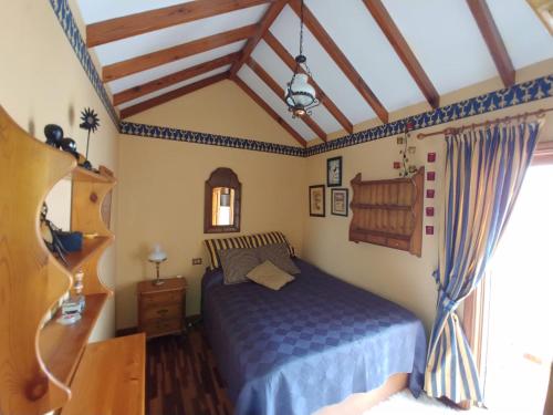 En eller flere senge i et værelse på Casa Marta