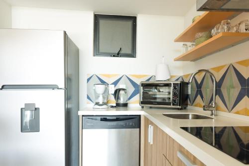 Dapur atau dapur kecil di Opal Suites Apartments