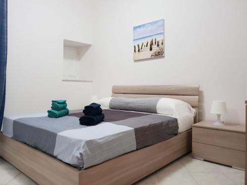 Ένα ή περισσότερα κρεβάτια σε δωμάτιο στο Appartamento TE&ME