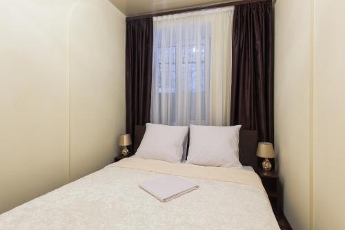 Säng eller sängar i ett rum på Hotel Cristal