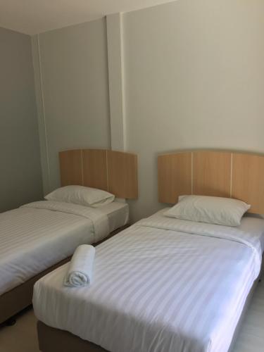 Ένα ή περισσότερα κρεβάτια σε δωμάτιο στο Bulan Villa rayong
