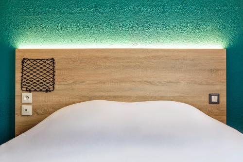 Cama o camas de una habitación en hotelF1 Toulouse L'Union