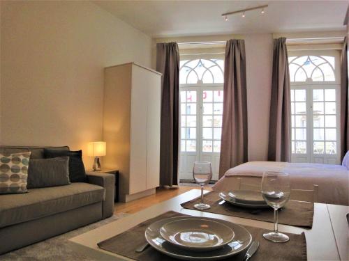 Et opholdsområde på Tiles Apartments