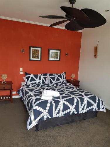 Zeally Bay Stay Jarrah Rumah tesisinde bir odada yatak veya yataklar