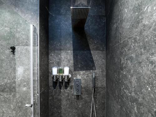 A bathroom at Exclusive Loft in Le Marais with AC