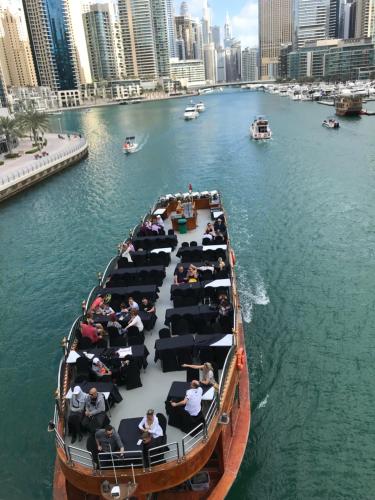 a group of people on a boat in the water at AL MARSA in Dubai