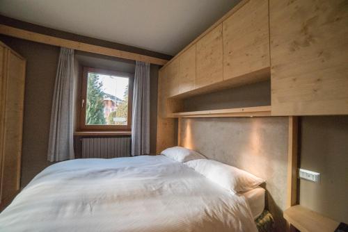 Llit o llits en una habitació de Hotel Terme