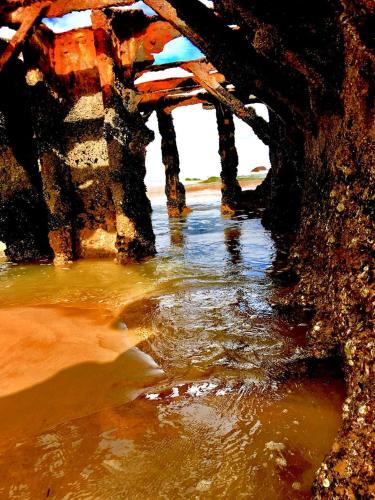 a view of the water under a bridge at Dolphin's Nook in Groot Brak Rivier