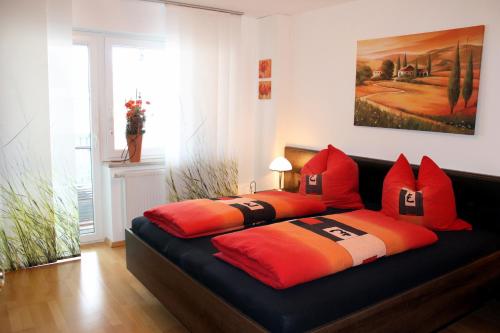 Un pat sau paturi într-o cameră la Ferienwohnung Geyer
