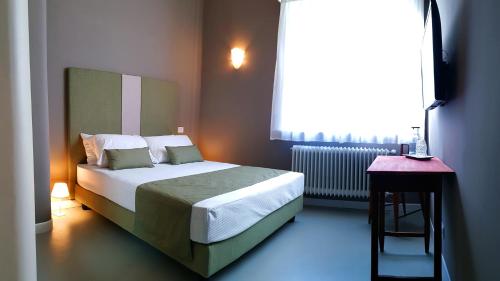 Letto o letti in una camera di Villa Gotti Charming Rooms