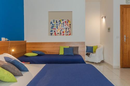 Posteľ alebo postele v izbe v ubytovaní Hotel Viterbo Inn