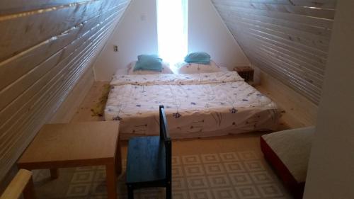 Un pat sau paturi într-o cameră la Vikendica Armin
