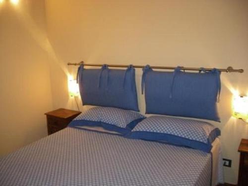 Ліжко або ліжка в номері Casa Nel Corso