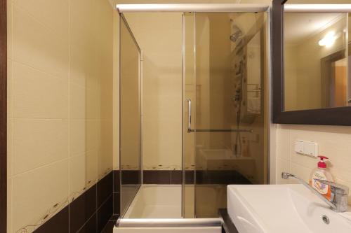 Ванная комната в Grata Apartments - Kiev