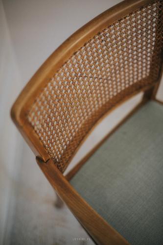 a close up of the back of a wooden chair at Leśniki in Babimost