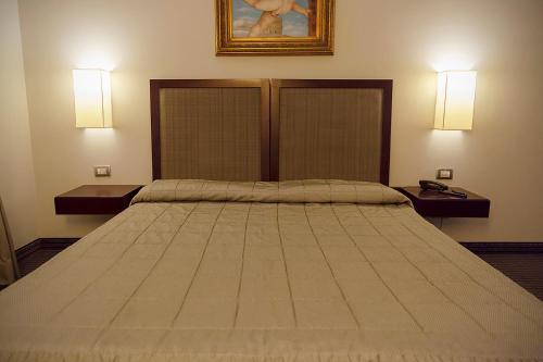 Hotel dei Gonzagaにあるベッド