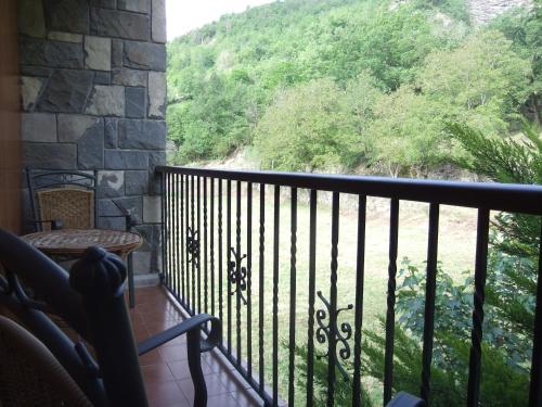 a balcony with a view of a mountain at Hotel Latre in Broto