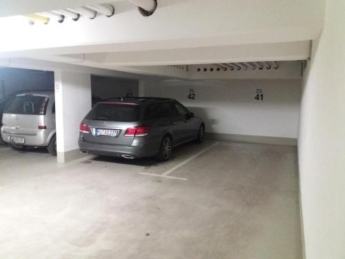 a car parked in a parking lot in a garage at Zum Inselparadies, Haus Meeresblick in Baabe
