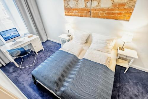 Ένα ή περισσότερα κρεβάτια σε δωμάτιο στο Apartamenty Lubartowska Street