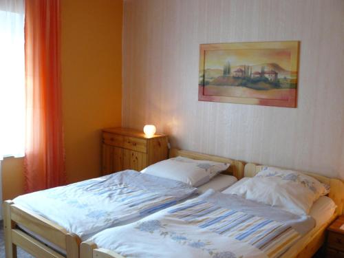 Postel nebo postele na pokoji v ubytování Ferienwohnungen Markgraf