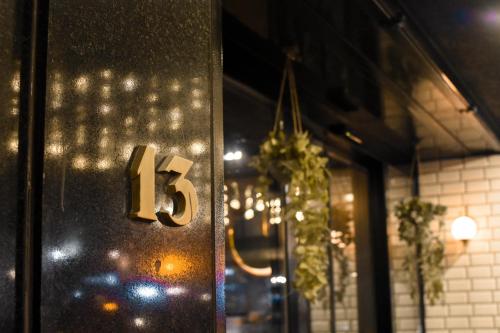 a number on the door of a restaurant at Dansaert Hotel in Brussels