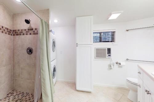 a bathroom with a shower and a toilet at Night Heron 18 in Hilton Head Island