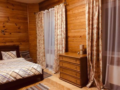 Postel nebo postele na pokoji v ubytování Візерунок