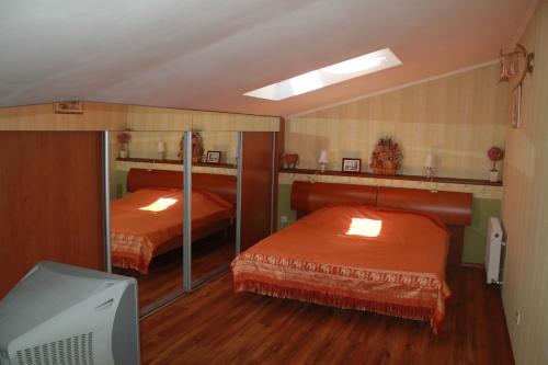Llit o llits en una habitació de Ugodessa Apartments
