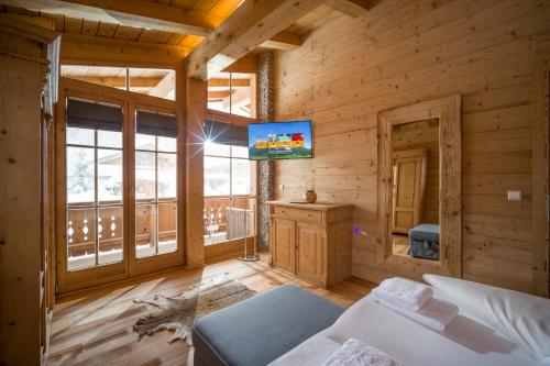 Haus Bellaにあるテレビまたはエンターテインメントセンター