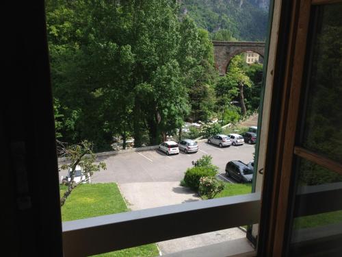a view from a window of a parking lot at Le Prieuré in Saint-Dalmas-de-Tende