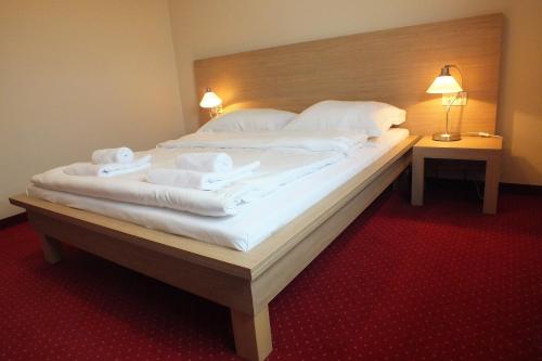 Posteľ alebo postele v izbe v ubytovaní Motel Subaru