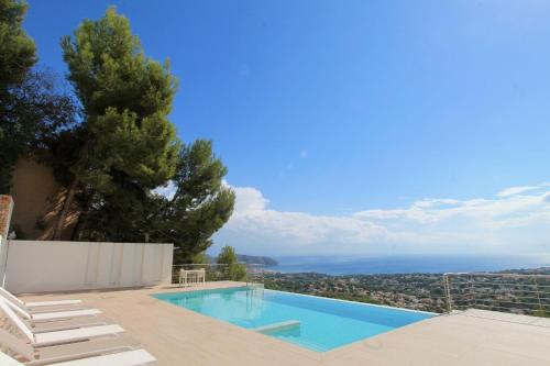 a swimming pool in a villa with a view at Villa Wivine in Moraira