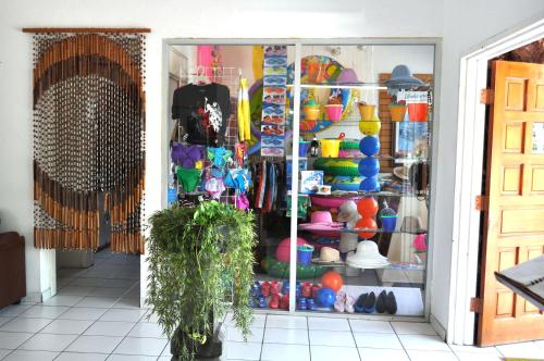 a shop with a display case filled with colorful items at Canadian Resort Veracruz in Costa Esmeralda