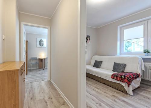 Postel nebo postele na pokoji v ubytování Apartament Nadmorski - ACCO RENT