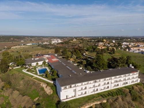 an aerial view of a building on a hill at Parador de Ayamonte in Ayamonte