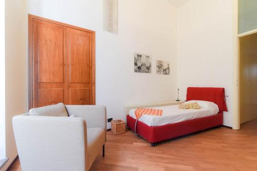 Una cama o camas en una habitación de Via Natta 15 - The House Of Travelers