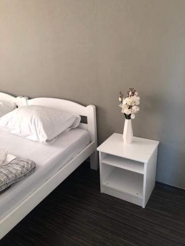 Ένα ή περισσότερα κρεβάτια σε δωμάτιο στο Rooms Nikola Rule Ostojic