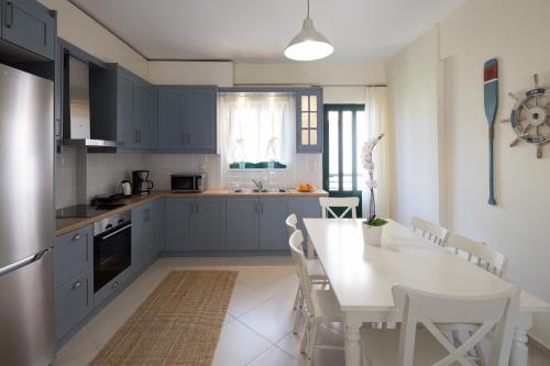 Kuchyňa alebo kuchynka v ubytovaní KHouses Maissonette
