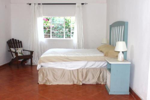 Кровать или кровати в номере Butterfly Apartments