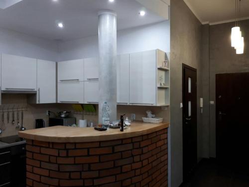 Apartament Twoja Przystańにあるキッチンまたは簡易キッチン