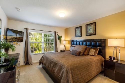 Кровать или кровати в номере Olivia's Dream Villa on WindsorHills
